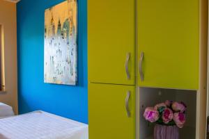 A bed or beds in a room at Residence l'Ogliastro