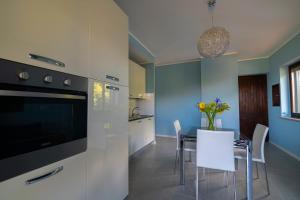 A kitchen or kitchenette at Residence l'Ogliastro