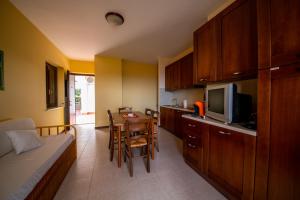 A kitchen or kitchenette at Residence l'Ogliastro