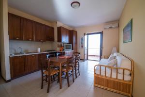 A kitchen or kitchenette at Residence l'Ogliastro