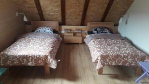 Letto o letti in una camera di Apartmani Milekić