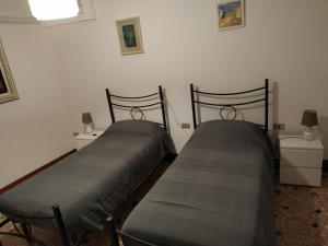 Lova arba lovos apgyvendinimo įstaigoje Guizzo apartment Venezia