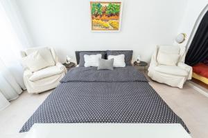 Posteľ alebo postele v izbe v ubytovaní Vintage Elegance MostCentralApt !Váci street!