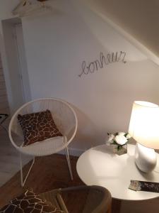 Posezení v ubytování Chambres D´Hôtes Herbes Folles