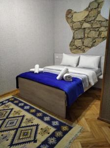 Postel nebo postele na pokoji v ubytování Guesthouse Litoros