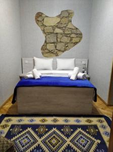 Postel nebo postele na pokoji v ubytování Guesthouse Litoros