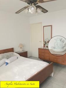 Кровать или кровати в номере Nely's House en Mendoza