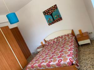 Postelja oz. postelje v sobi nastanitve Casa al mare De Luca-Paparo