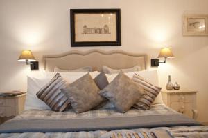 Un pat sau paturi într-o cameră la Town House 62