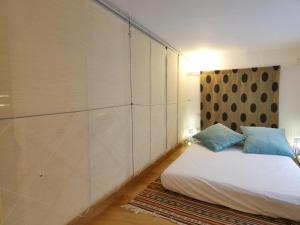 ラスパルマス・デ・グランカナリアにあるLoft Australiaのベッドルーム1室(ベッド1台付)、