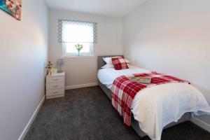 Postel nebo postele na pokoji v ubytování PREMIER - Wishaw En-Suite Apartment + 9 fotografií