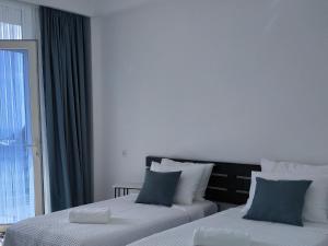Voodi või voodid majutusasutuse Kolkhi Guest House toas