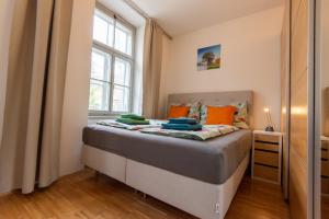Posteľ alebo postele v izbe v ubytovaní Appartements in Graz beim LKH