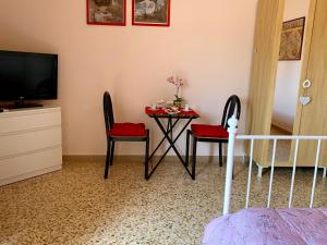 TV a/nebo společenská místnost v ubytování Luna Piena B&B