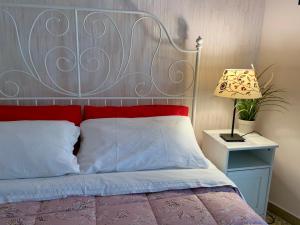 Postel nebo postele na pokoji v ubytování Luna Piena B&B