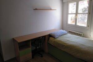 Łóżko lub łóżka w pokoju w obiekcie BONITO ALOJAMIENTO EN BRIONES