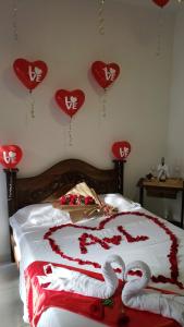 Voodi või voodid majutusasutuse Hotel Palmari toas