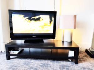 TV a/nebo společenská místnost v ubytování Glen View Apartments