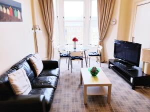 TV a/nebo společenská místnost v ubytování Glen View Apartments