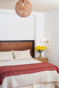 Uma cama ou camas num quarto em Casa Pando