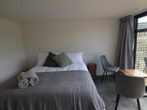 Katil atau katil-katil dalam bilik di Kaiteriteri Abel Tasman Inlet Views