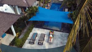 Bazén v ubytování Gili Palms Resort nebo v jeho okolí