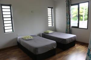 Letto o letti in una camera di KEHA PROPERTIES