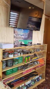 a display cabinet filled with lots of toy cars at Turismo FORTALEZA PATAGONIA in Puerto Natales