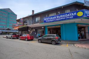 Fotografija u galeriji objekta Lazy Cat Home At Gaya Street u gradu Kota Kinabalu