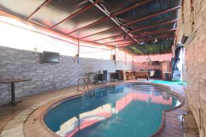 Bazén v ubytování Eureka Hotel nebo v jeho okolí