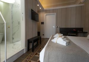 Posteľ alebo postele v izbe v ubytovaní B&B Palazzo Perrotta