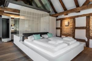Ένα ή περισσότερα κρεβάτια σε δωμάτιο στο Zollhaus