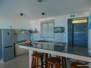 Η κουζίνα ή μικρή κουζίνα στο Fullmoon Apartment & Studio