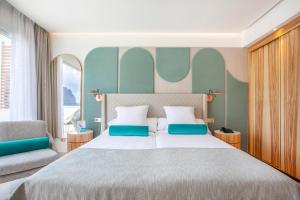 Postel nebo postele na pokoji v ubytování Grupotel Molins
