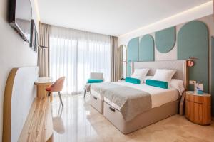Postel nebo postele na pokoji v ubytování Grupotel Molins