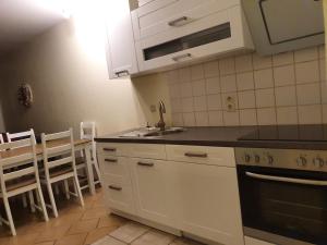 Η κουζίνα ή μικρή κουζίνα στο Ferienwohnung Am Paradies +11 φωτογραφίες