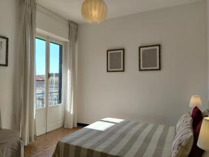 A bed or beds in a room at Bianca House Sea View