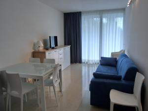 TV a/nebo společenská místnost v ubytování Residence Mimose