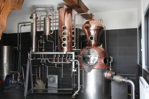 a kitchen with a scientific equipment on the wall at Gasthaus Hirsch in Ersingen