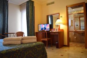 TV a/nebo společenská místnost v ubytování Hotel Palace 2000