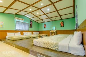 Posezení v ubytování Hai Yuan Bungalow II