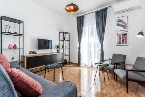 TV a/nebo společenská místnost v ubytování Apartments Tanya