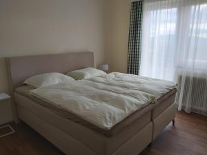 Postel nebo postele na pokoji v ubytování Haus Fernblick + 35 fotografií
