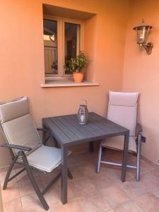 Khu vực ghế ngồi tại Ferienwohnung Bournville +9 ảnh