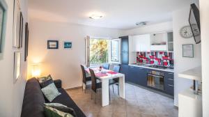 Kuchyň nebo kuchyňský kout v ubytování Apartment Prošpe