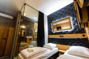 Posteľ alebo postele v izbe v ubytovaní Lord Jack Apartments