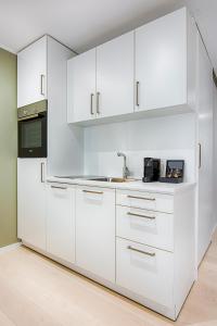 Η κουζίνα ή μικρή κουζίνα στο Business Hotel Maier