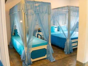 Voodi või voodid majutusasutuse Zimmer Rest toas