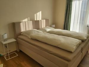 Postel nebo postele na pokoji v ubytování Haus Fernblick