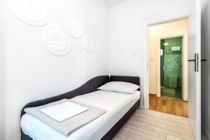 Postel nebo postele na pokoji v ubytování Apartments Tanya